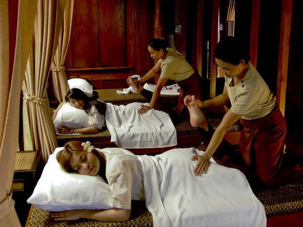 Thai massage, also known as Nuad bo-rarn, is a traditional healing practice that combines acupressure, assisted yoga poses, and deep stretching to enhance physical and mental well-being.